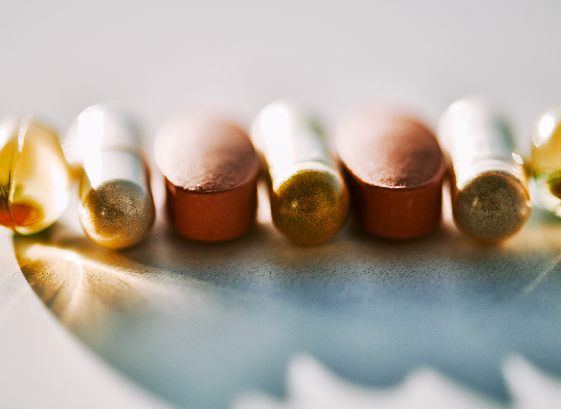 Colorful Assorted Pills and Capsules in Sunlight